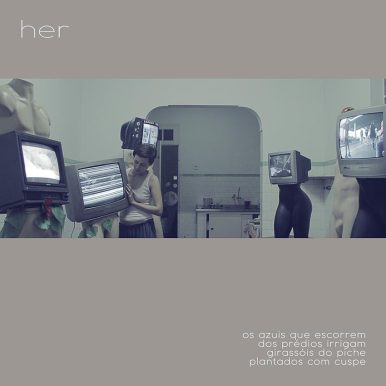 Her – Os azuis que escorrem dos prédios irrigam girassóis do piche plantados com cuspe